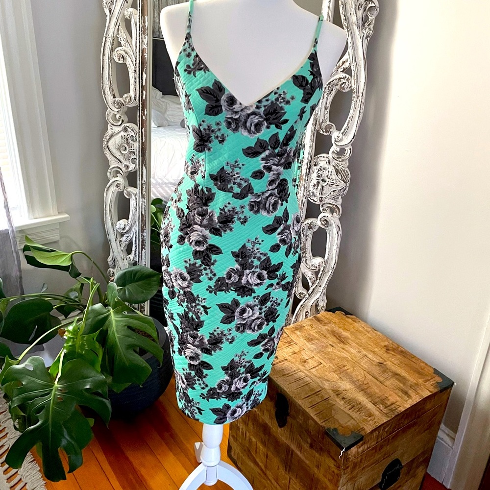 Like new size 6 ASOS dress. Worn once to a wedding! Material is thick with slit